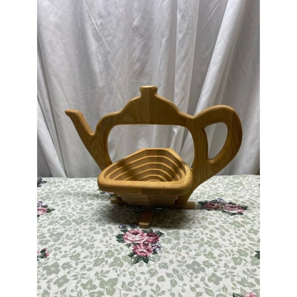 vintage wooden folding fruit basket and trivet shaped like a teapot